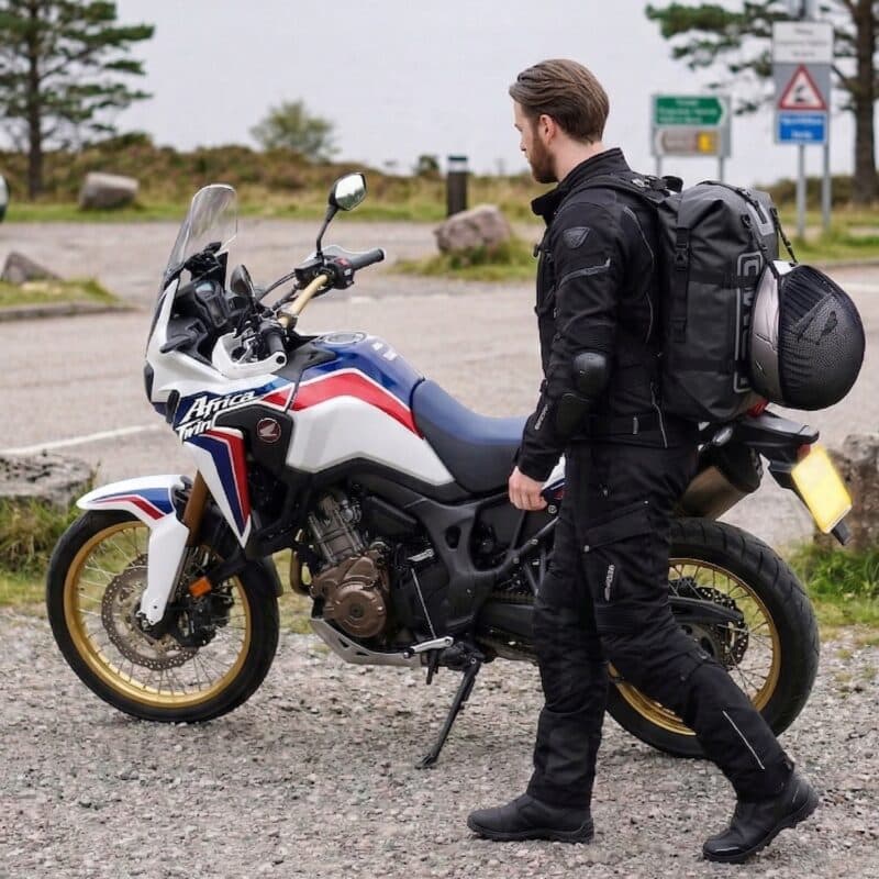 39L Dry Bag Rucksack with Helmet Carrier - Black Rider with Helmet in Netting